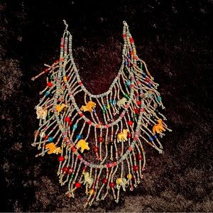 Hand crafted wearable Art! Triple level bead and animal necklace!